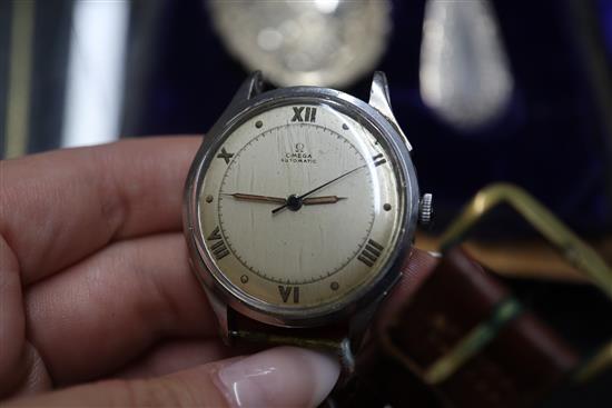 A Tissot gold wrist watch, one other 9ct gold wrist watch and an Omega stainless steel watch head.